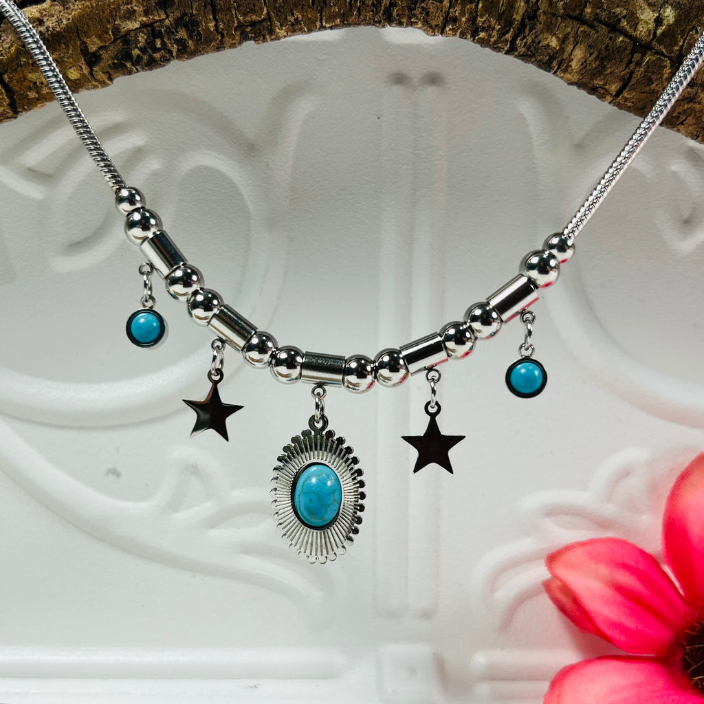 Silver Charm Necklace Stars and Feature pendant .