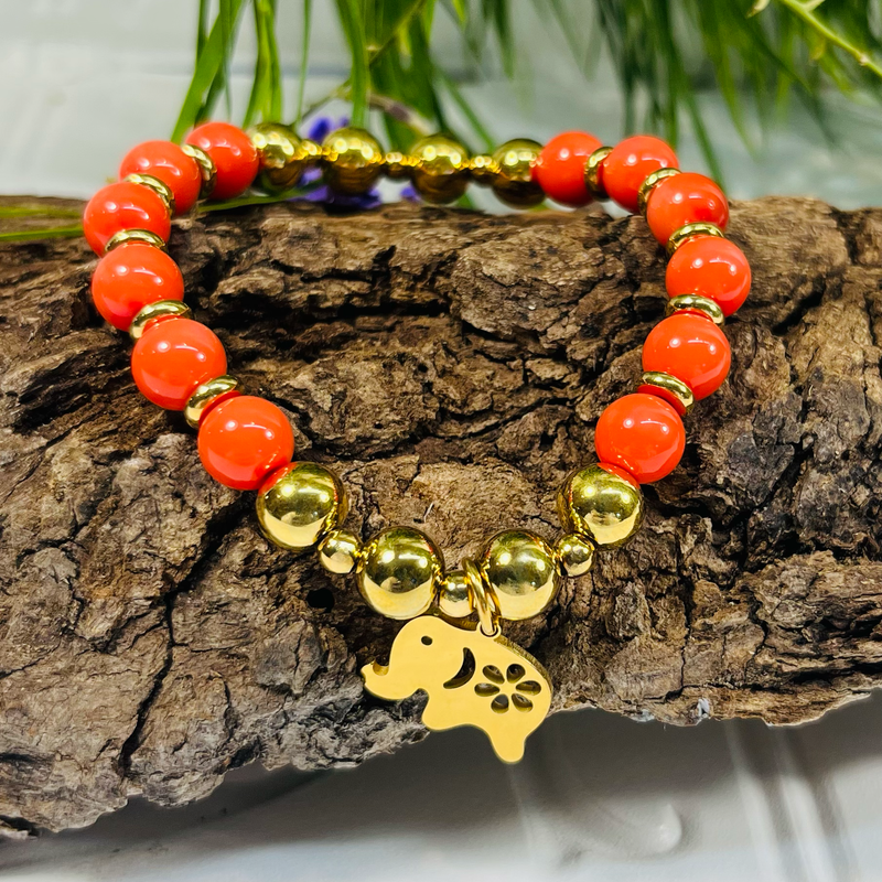 Gold Stretchy Beaded Bracelet With Charm